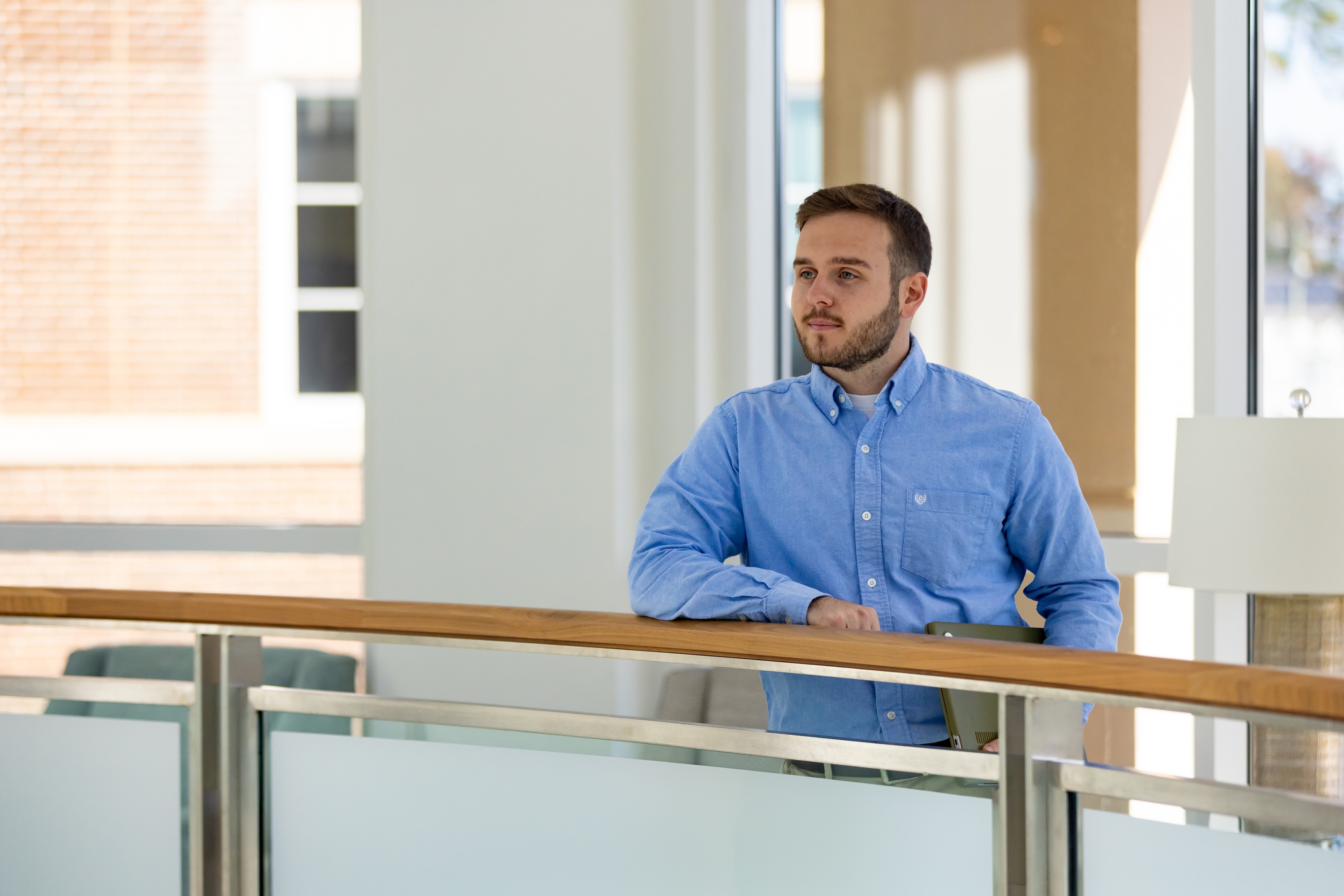 UNCP student overlooking balcony