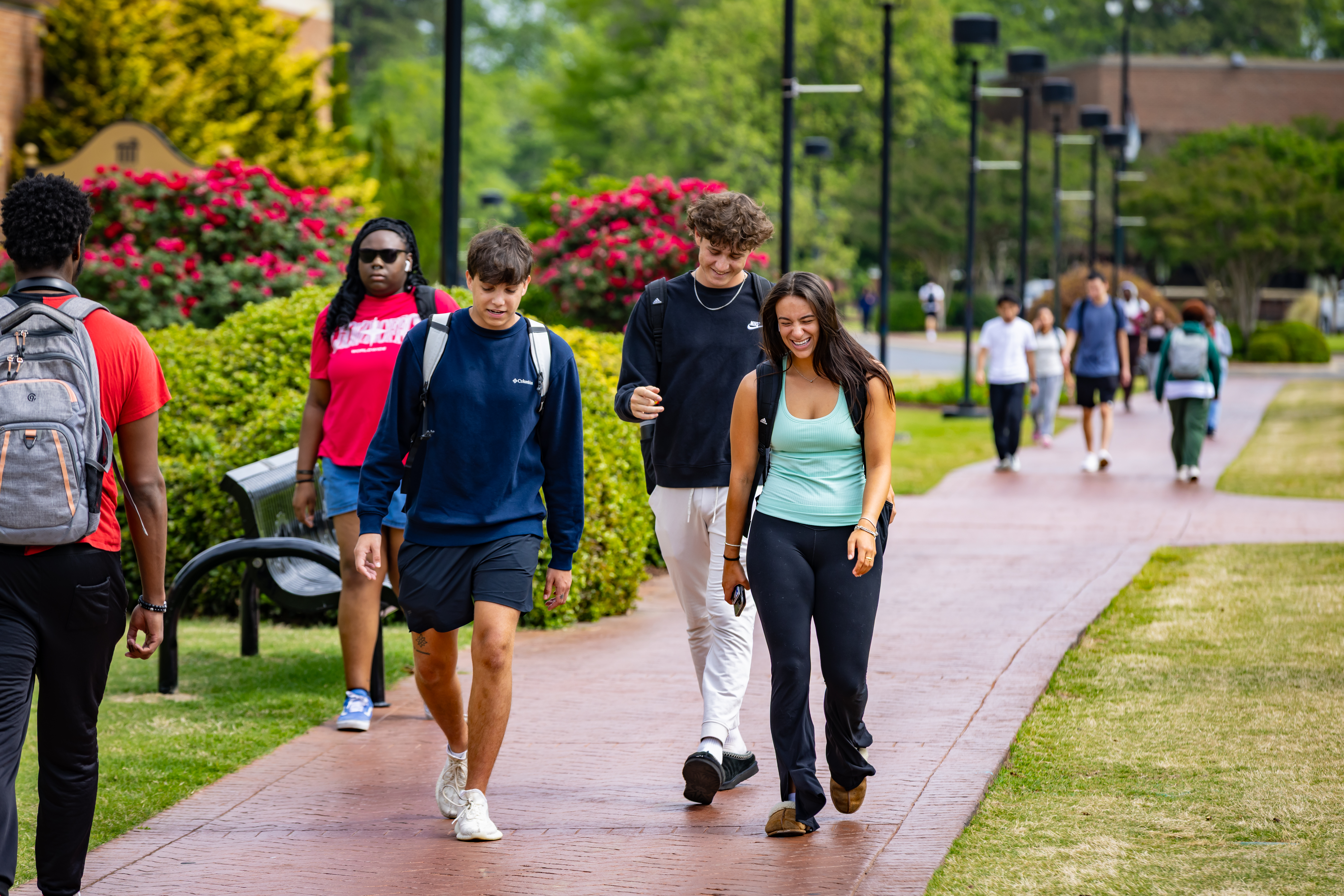 UNCP students walking across campus