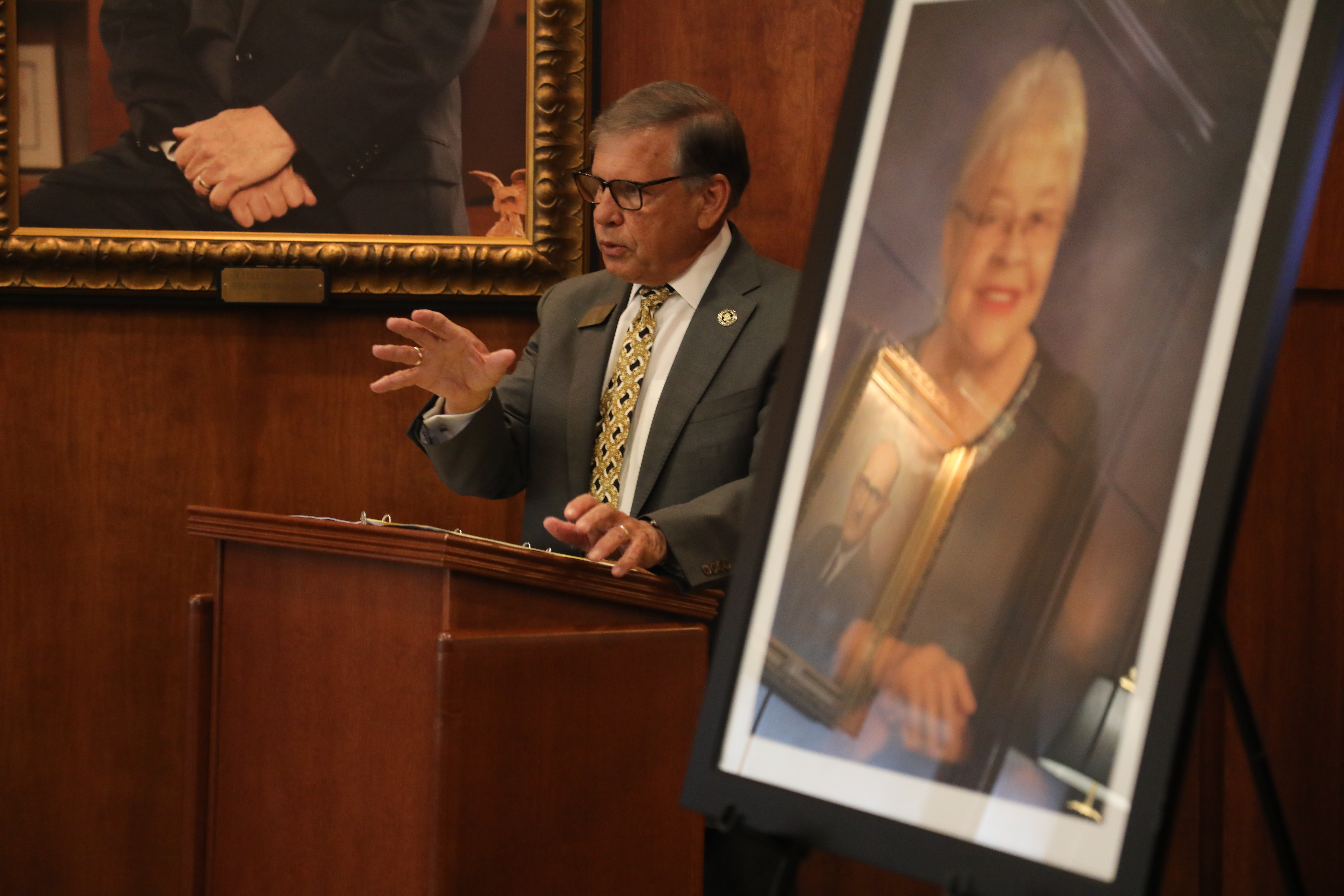 Chancellor Robin Cummings speaks at a ceremony in honor of the Oxendine's families