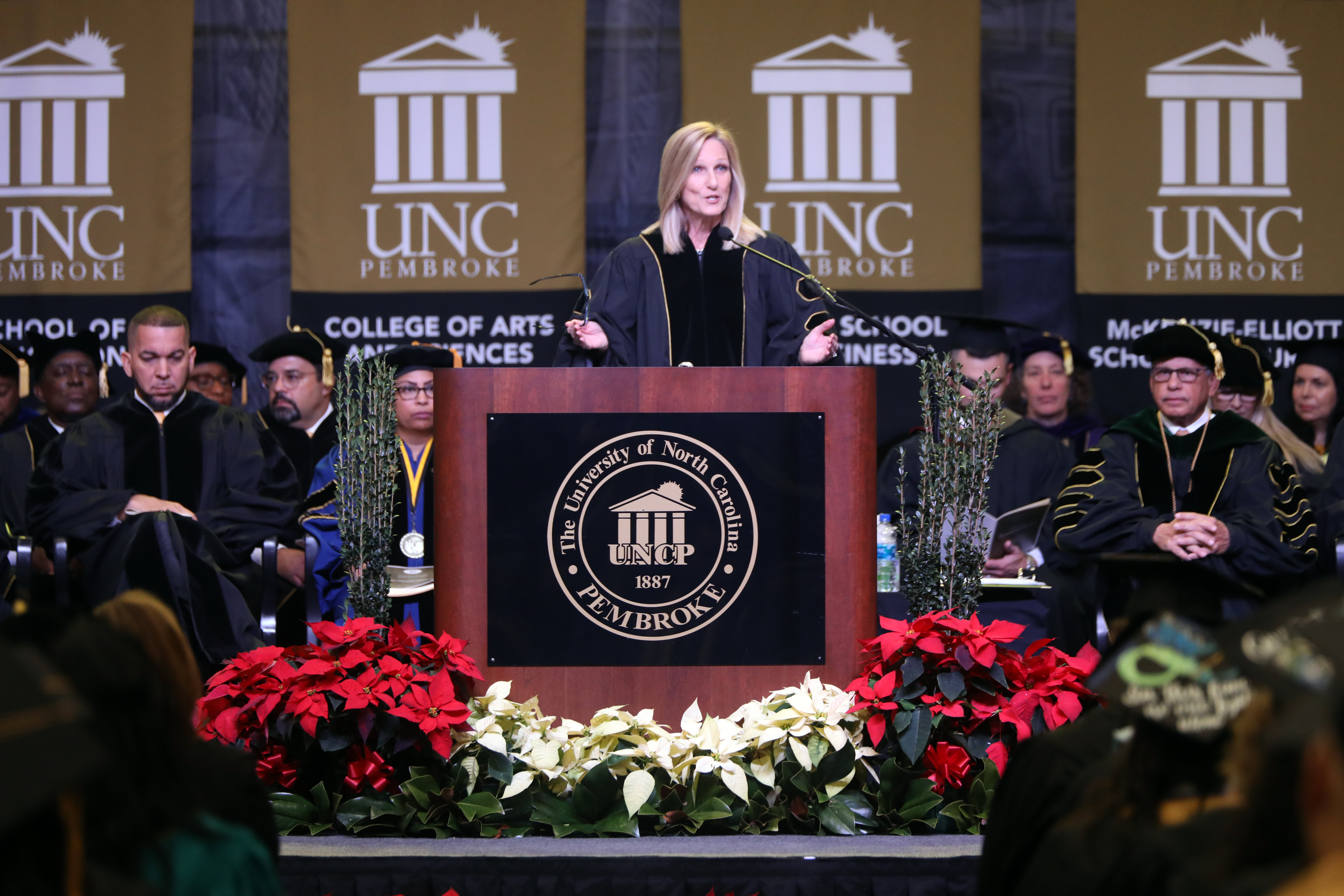 Cecilia Holden giving the keynote speech during Fall Commencement