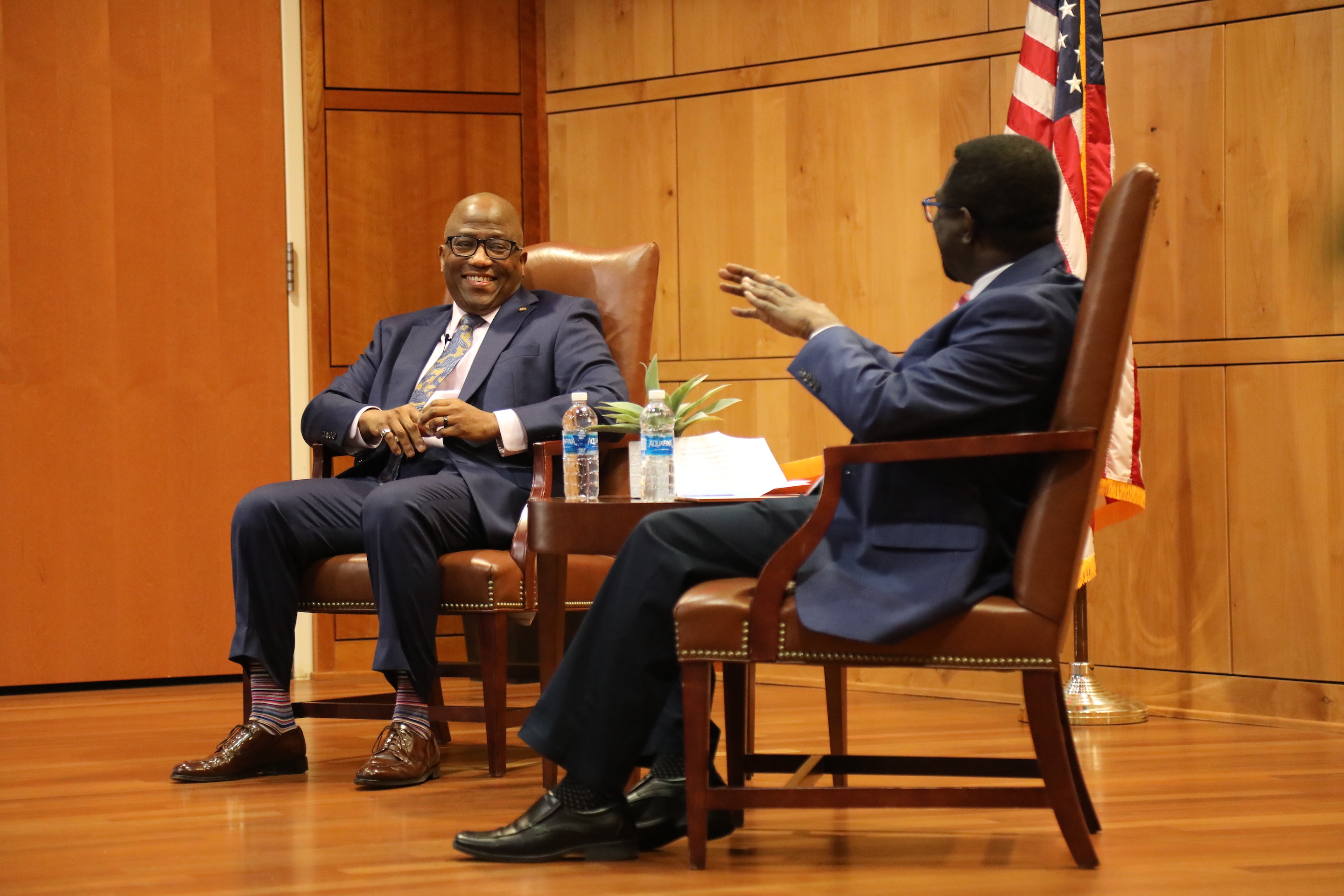 Dr. Cliff Mensah (right) conducts a fireside chat with Brigadier General Allen Jamerson (Ret.) as part of the Distinguished Speaker Series.