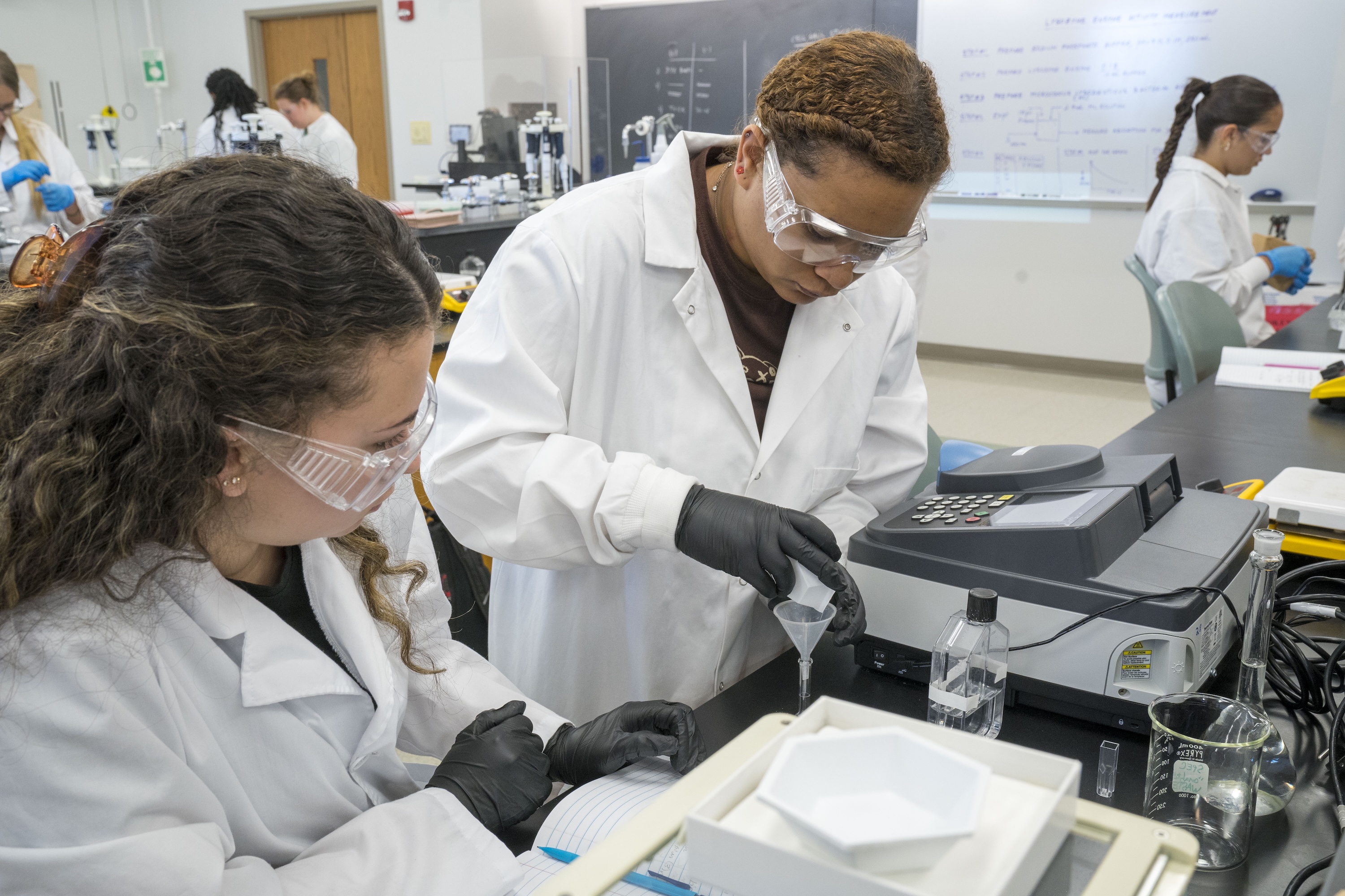 Chemistry Students Conduct a Lab Experiment