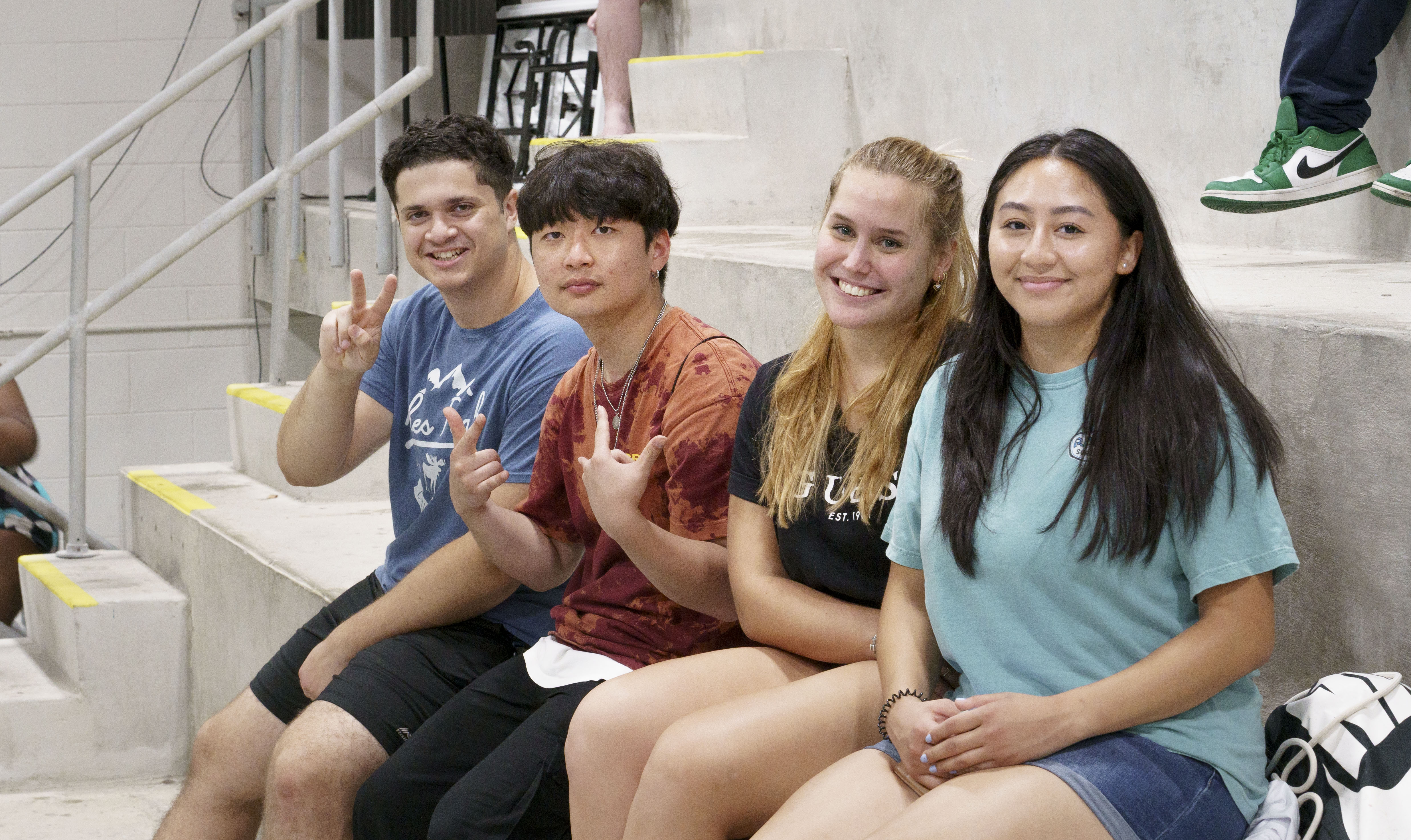 UNCP students cheering on the Braves in the Aquatic Center