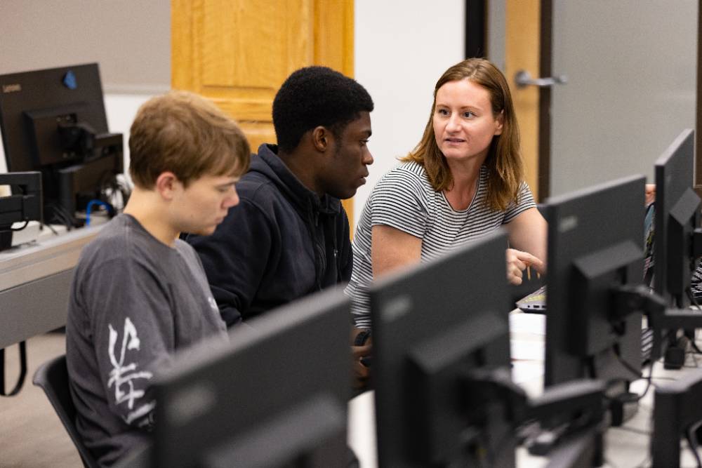 Teacher with students