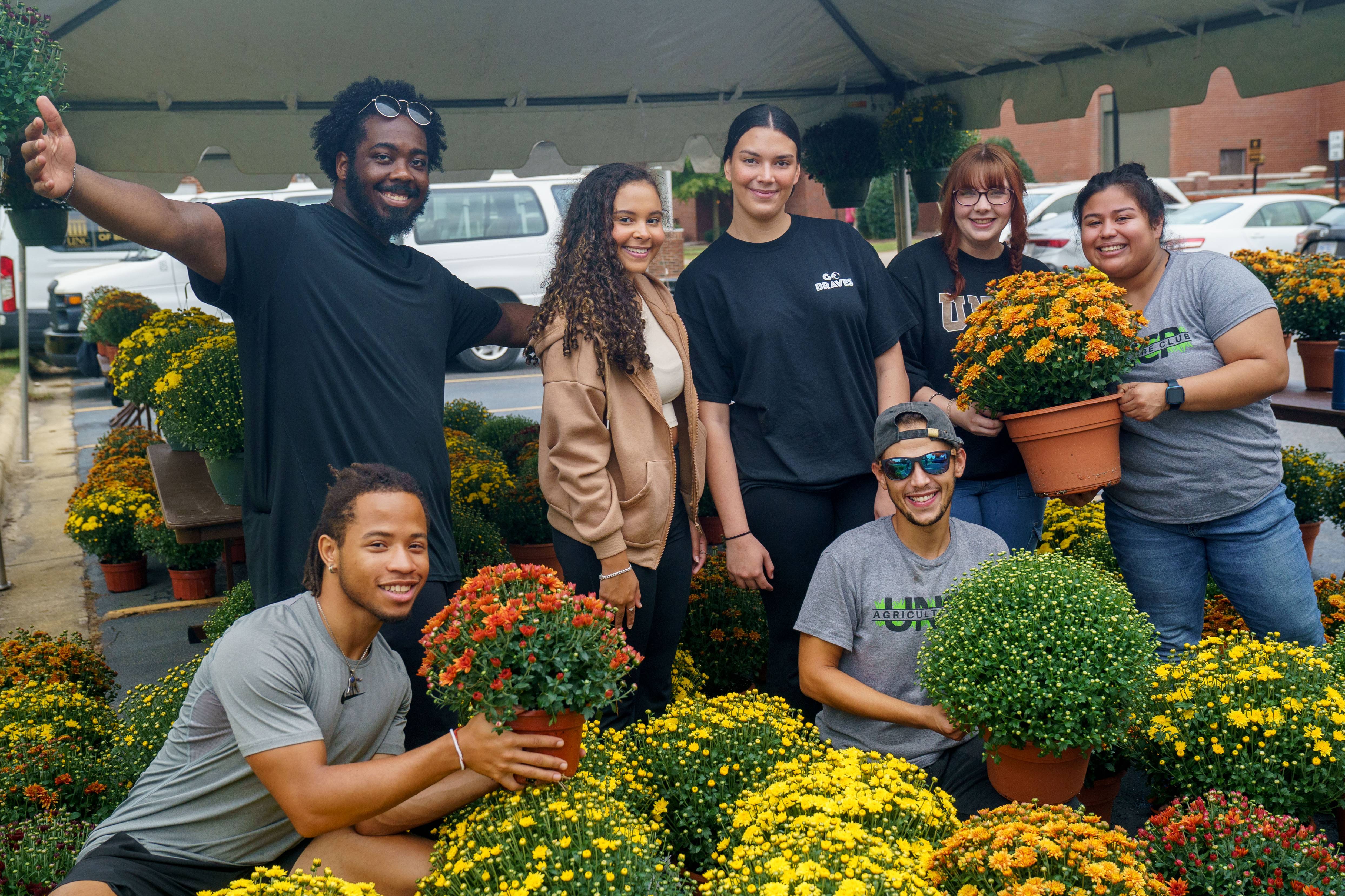 Students at the Agriculture Club's Mum Sale