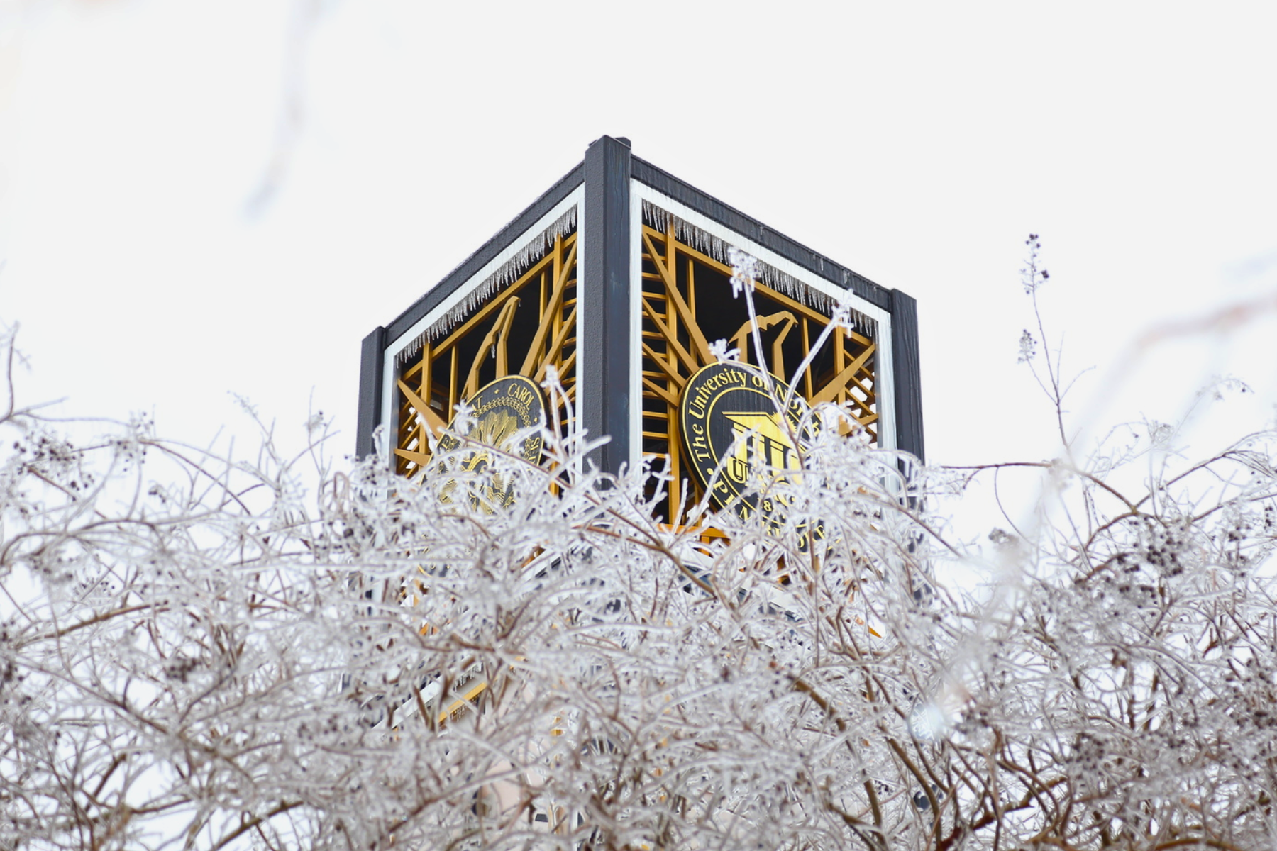 The Lowry Bell Tower on UNCP's campus covered in ice during inclement weather