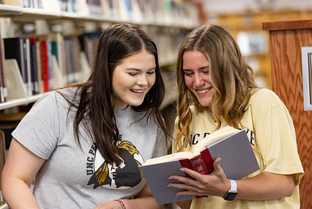 UNCP students in the library