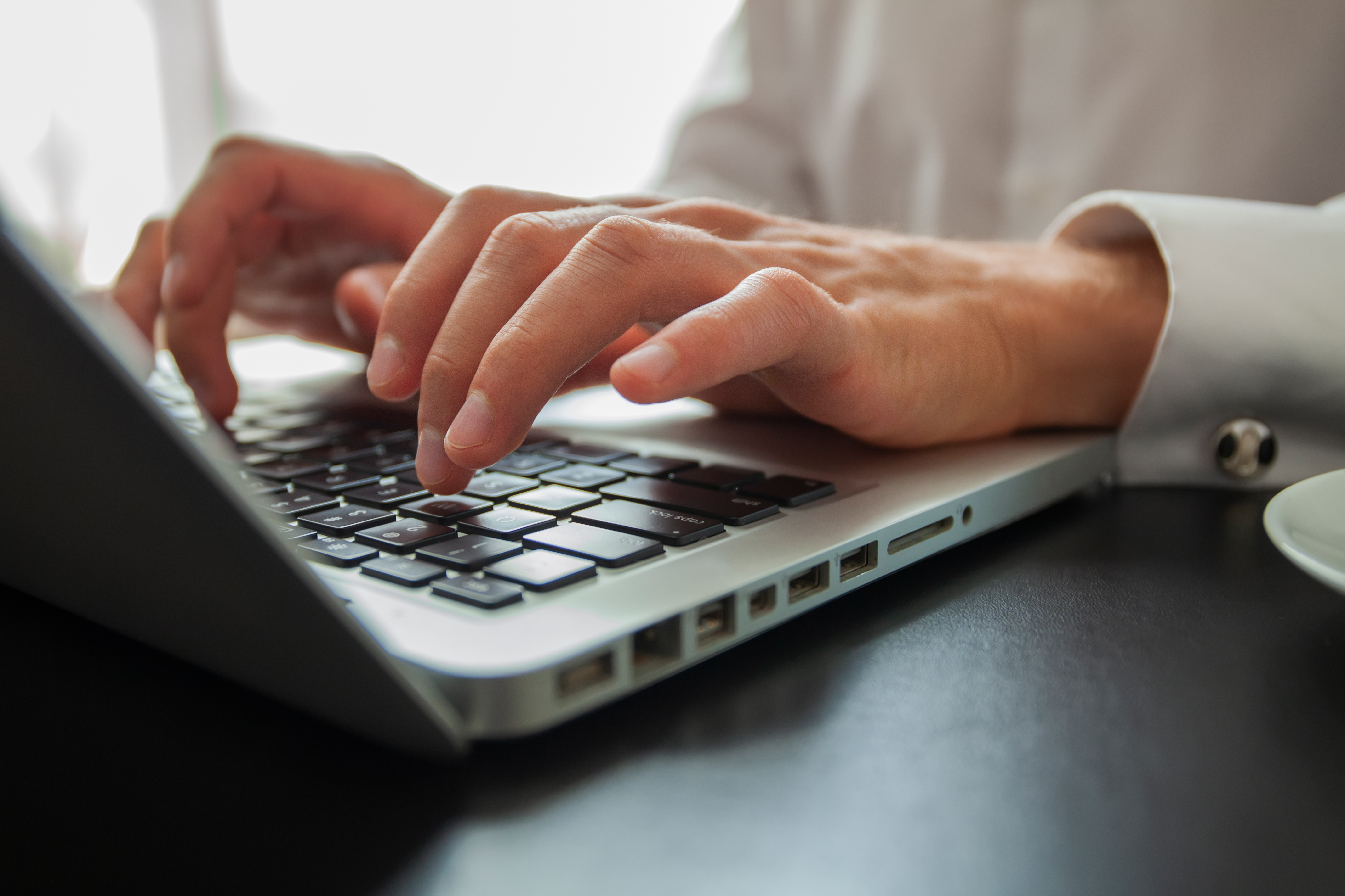 hands on a keyboard