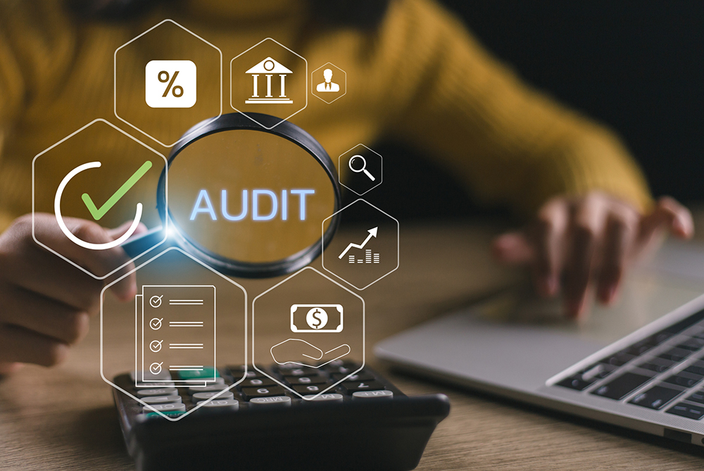 Person with an audit graphic around them