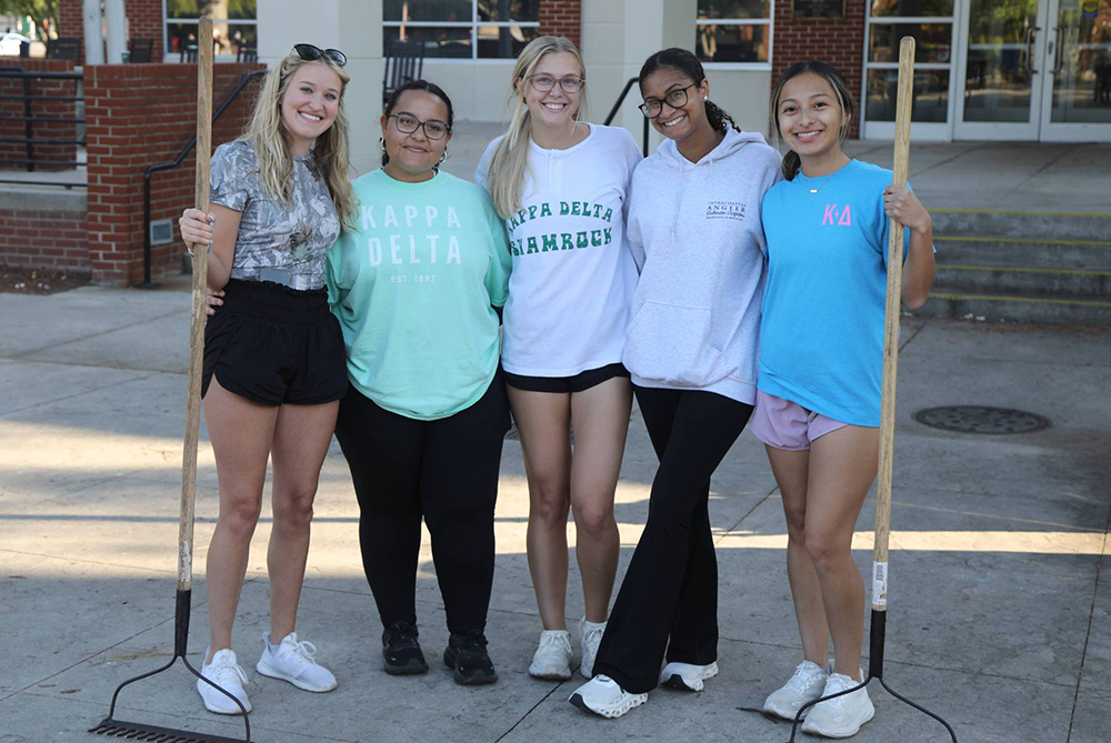 Members of Greek life volunteering together