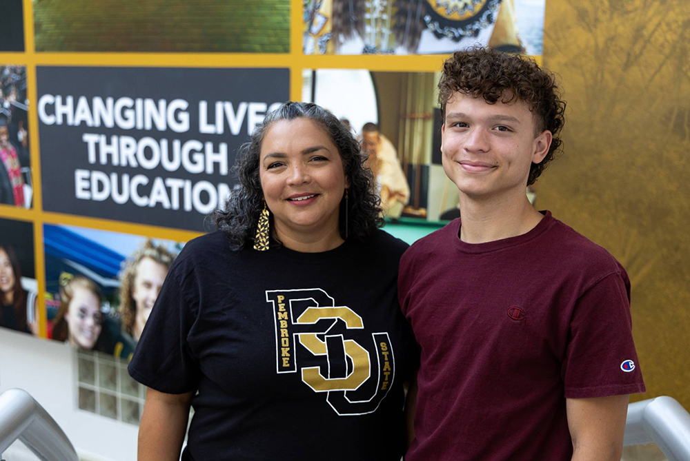 Member of Phi Sigma Nu with his mother