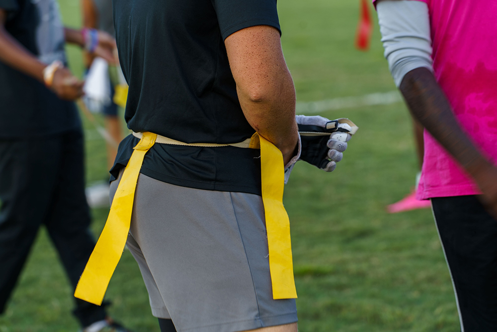 UNCP student playing flag football for campus rec