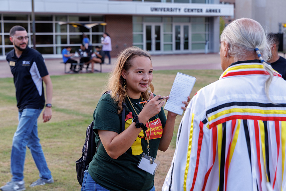 UNCP student at a PR event