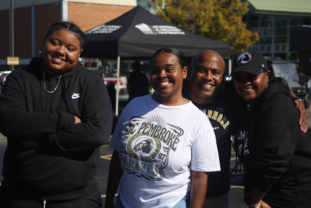 family standing for a photo
