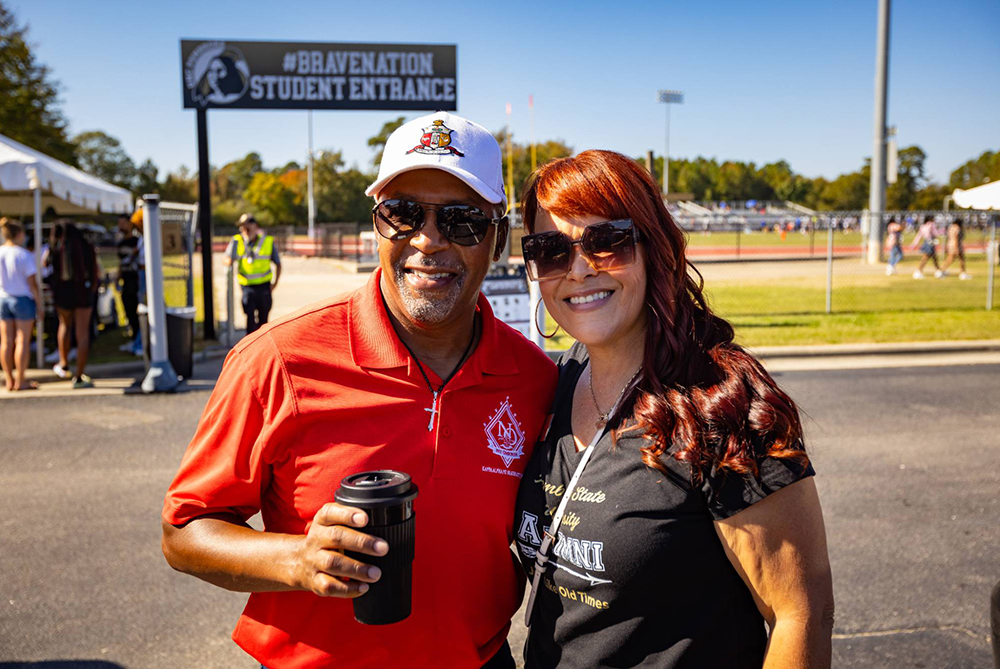 Greek life alum at a tailgate