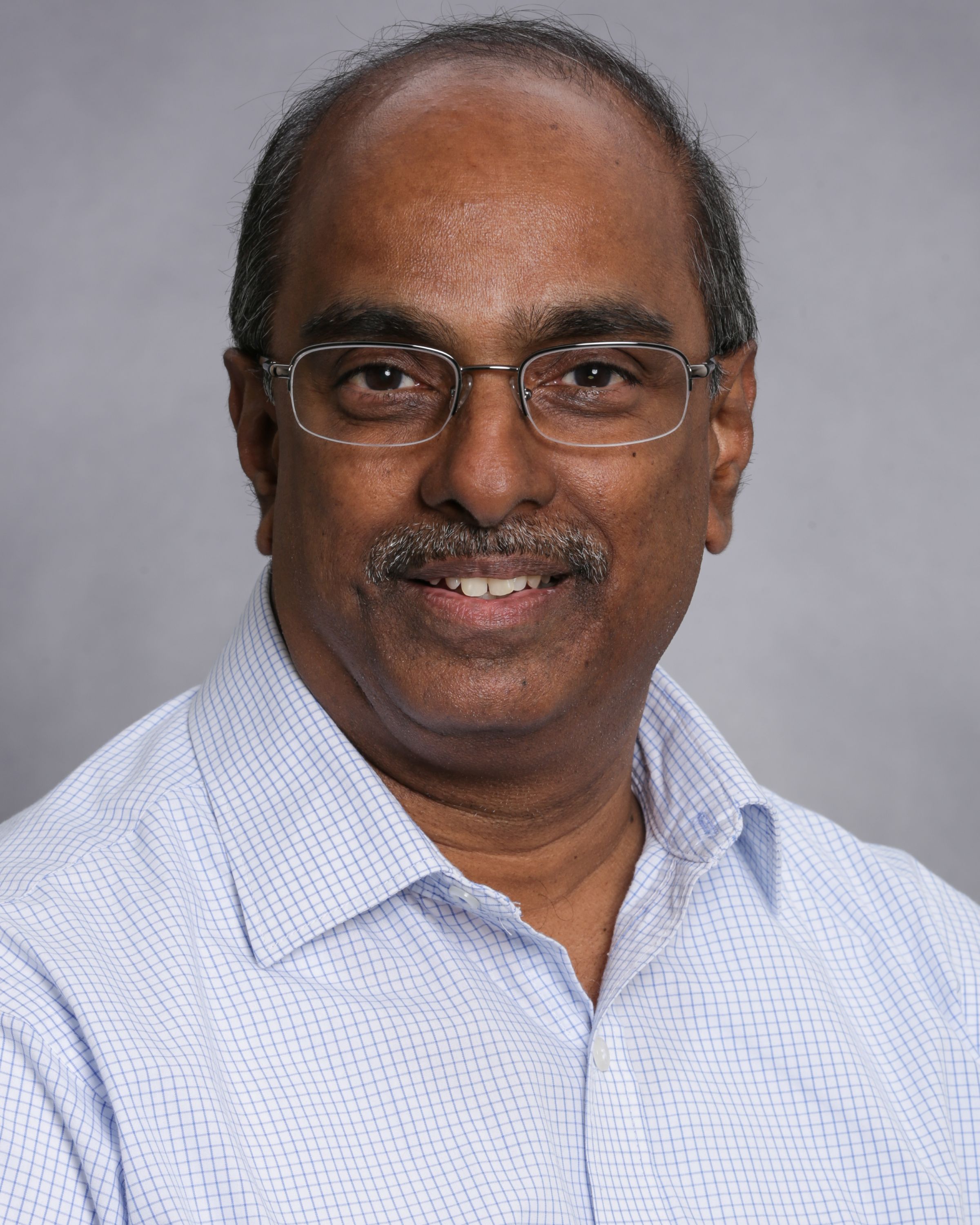 Siva Mandjiny, headshot