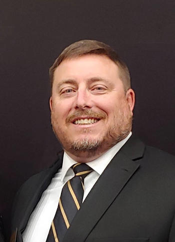 Justin Winans, headshot