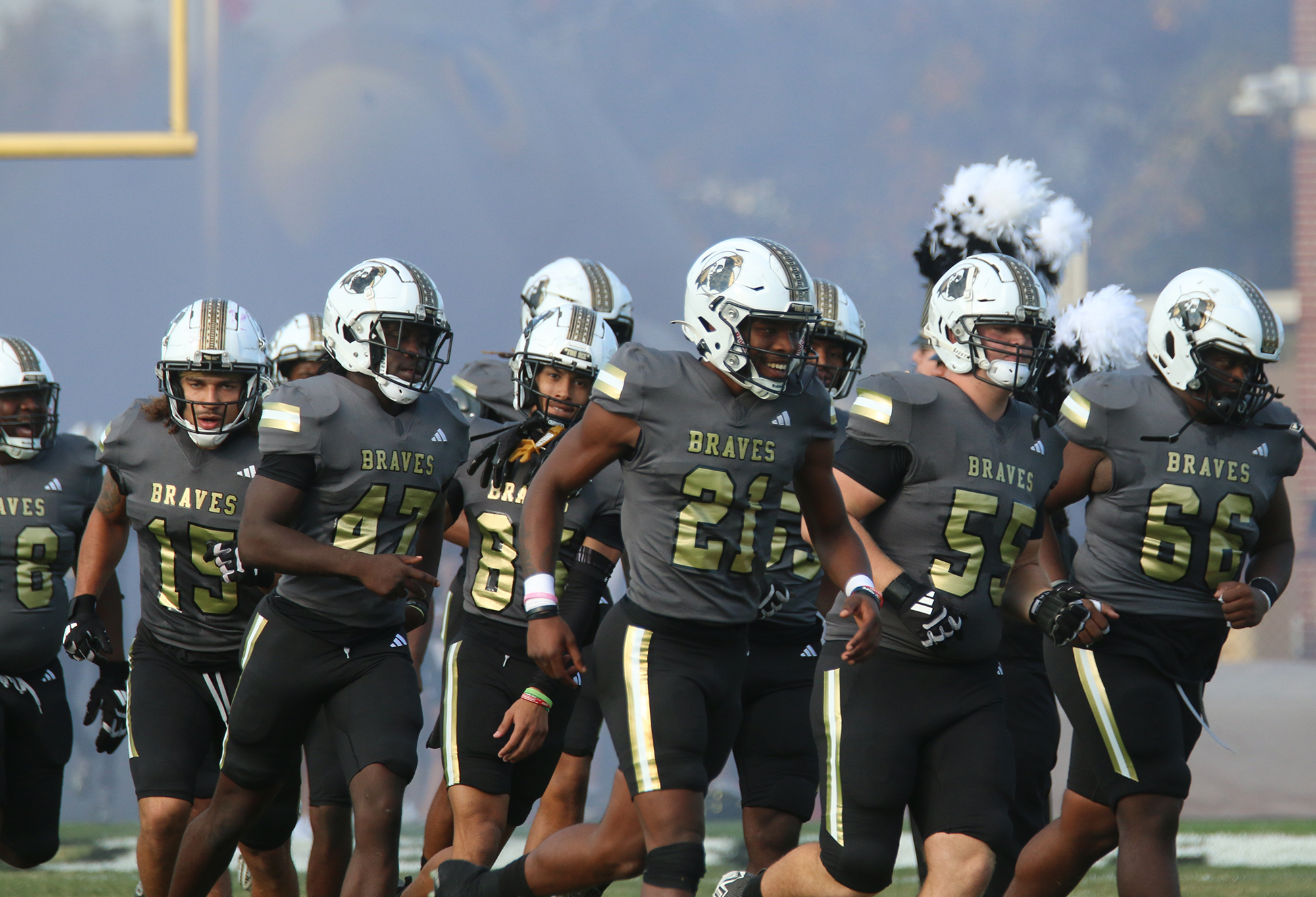 UNCP football players take the field