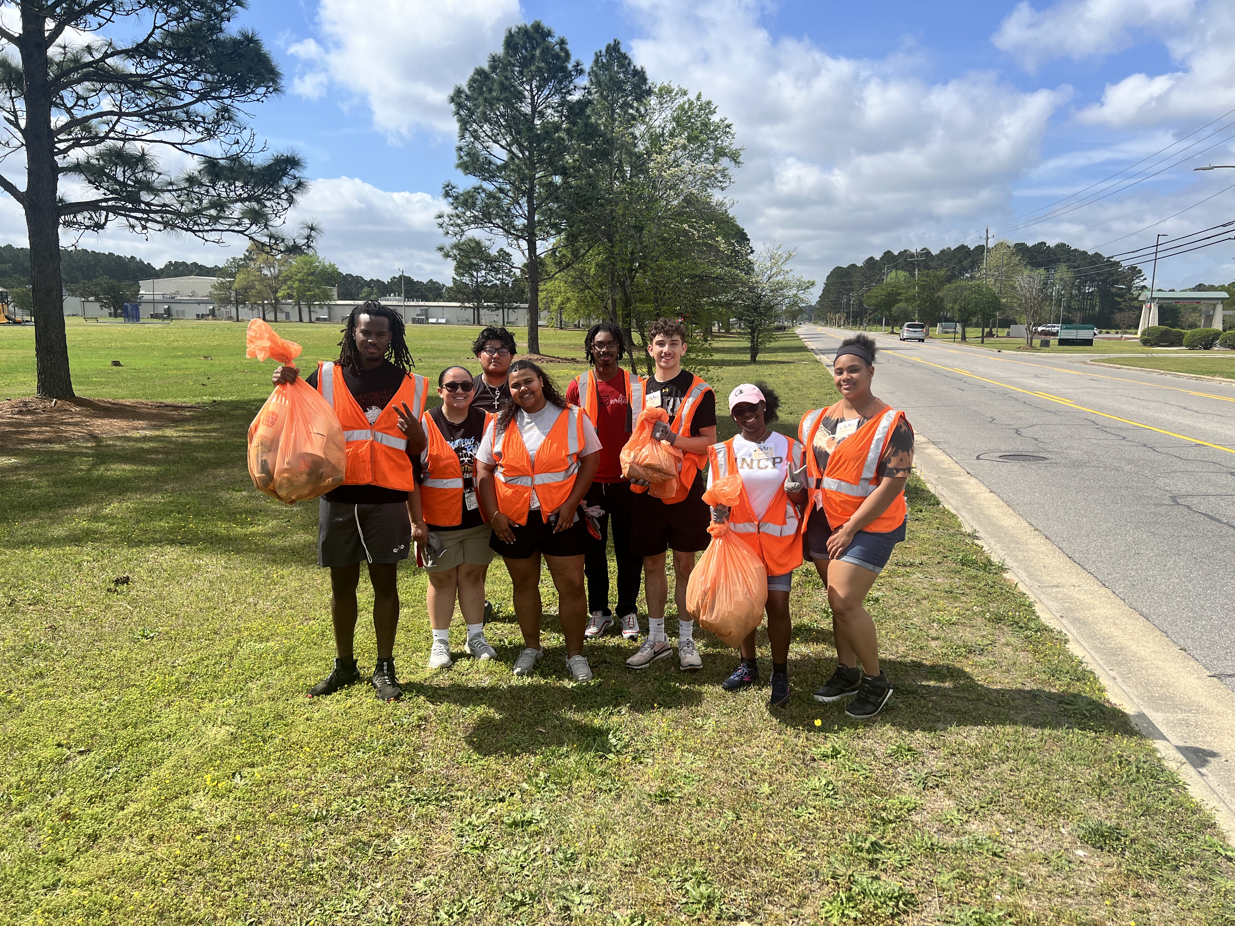 UNCP students volunteering at a Community Action Day clean up