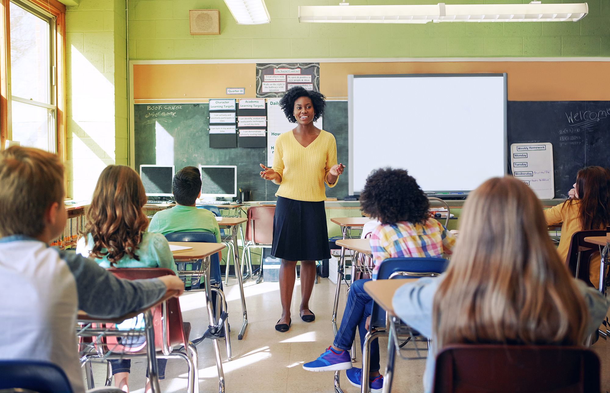 teacher with middle school students