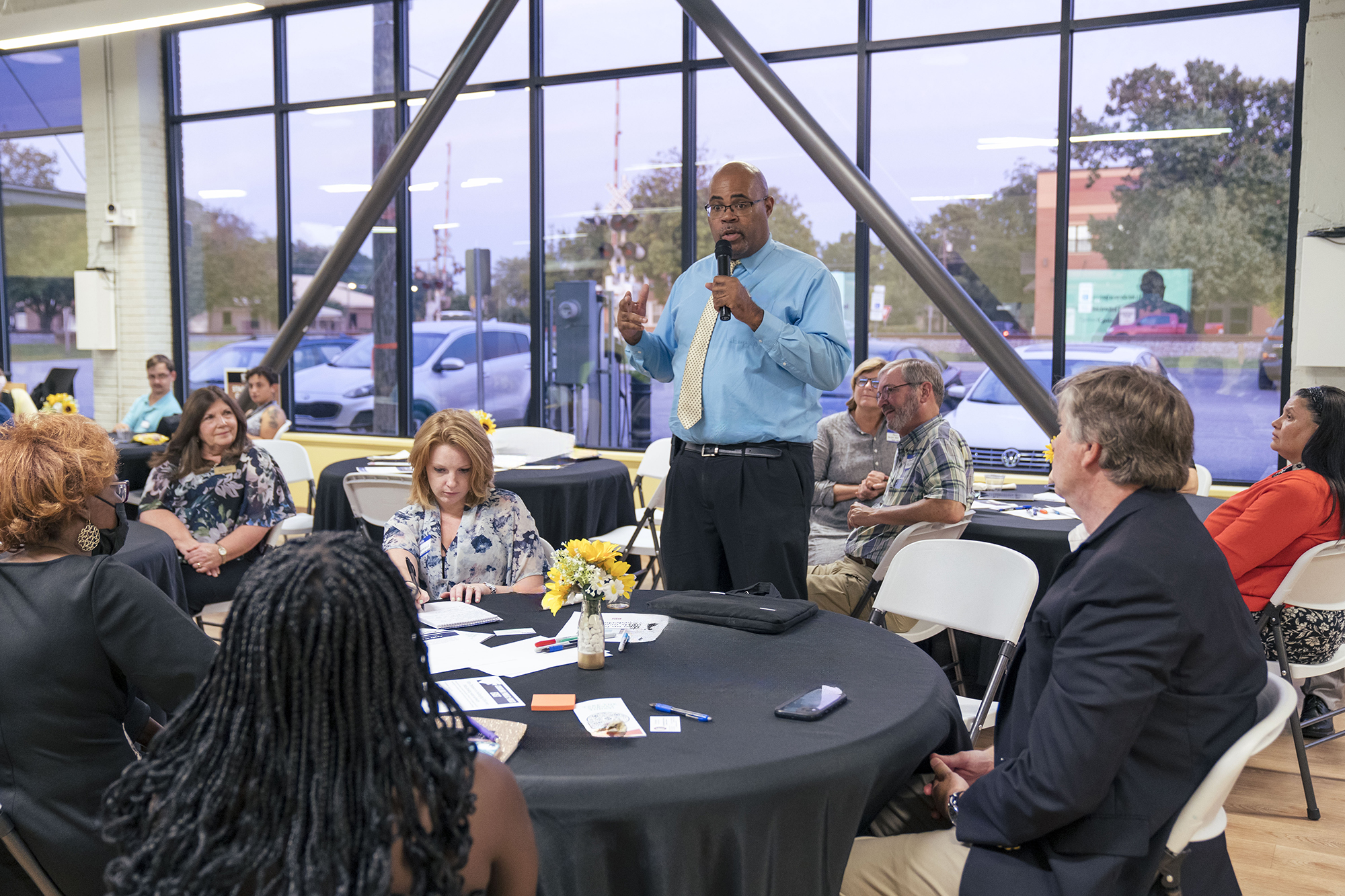group of volunteers at a meeting at the UNCP HUB