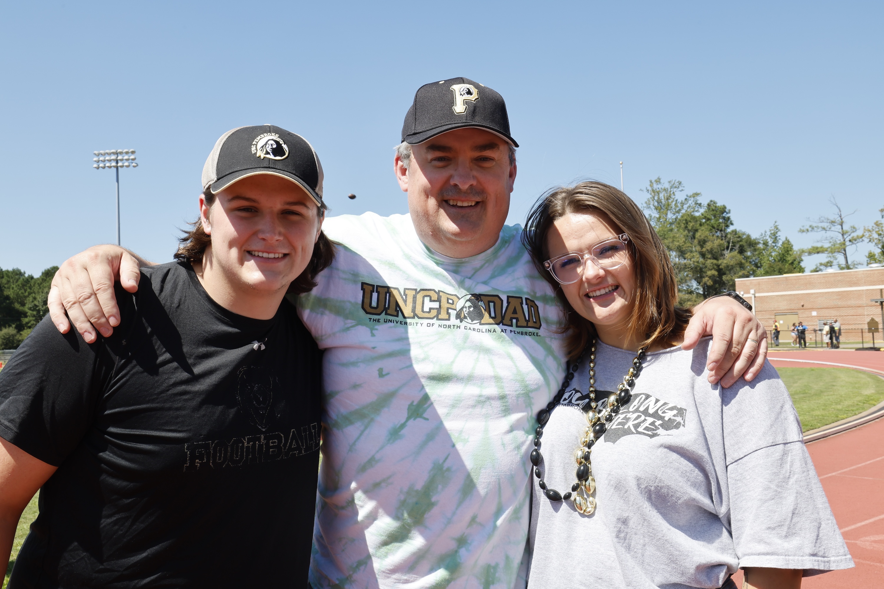male student with parents UNC Pembroke