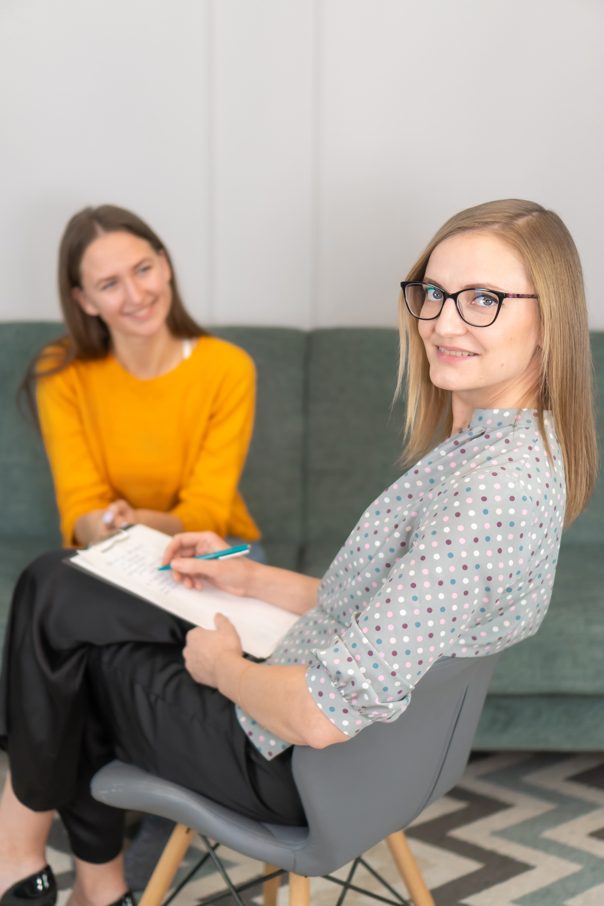 two women in a clinical counseling session talking