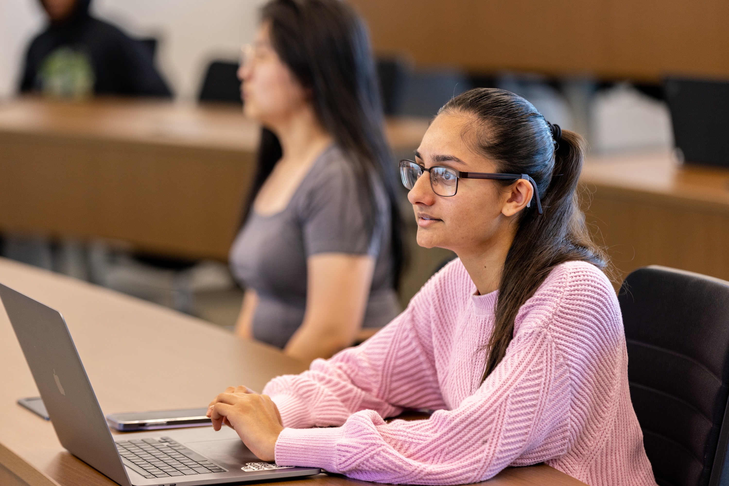 Student at laptop in class