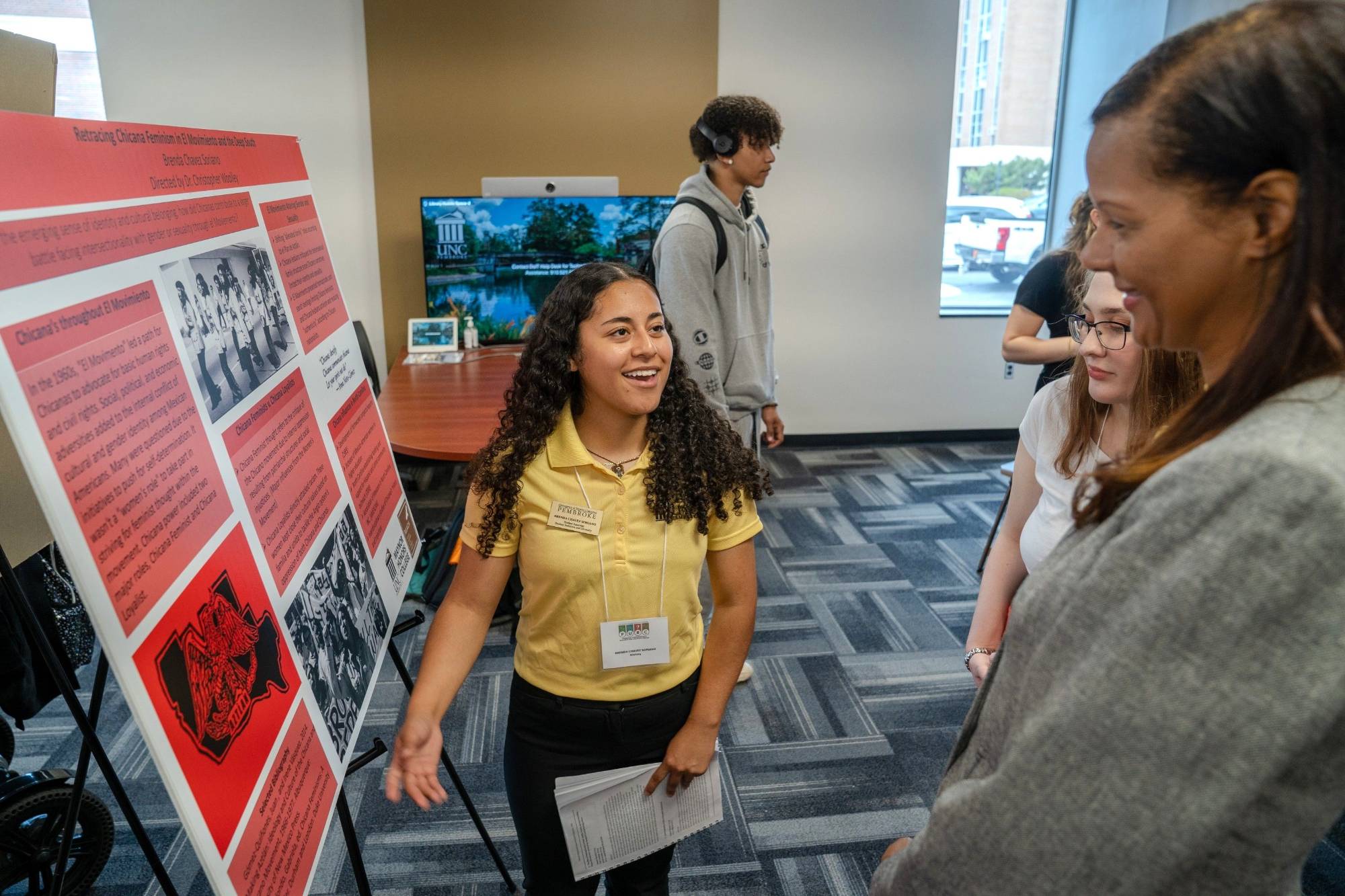 UNCP student presenting at a research conference