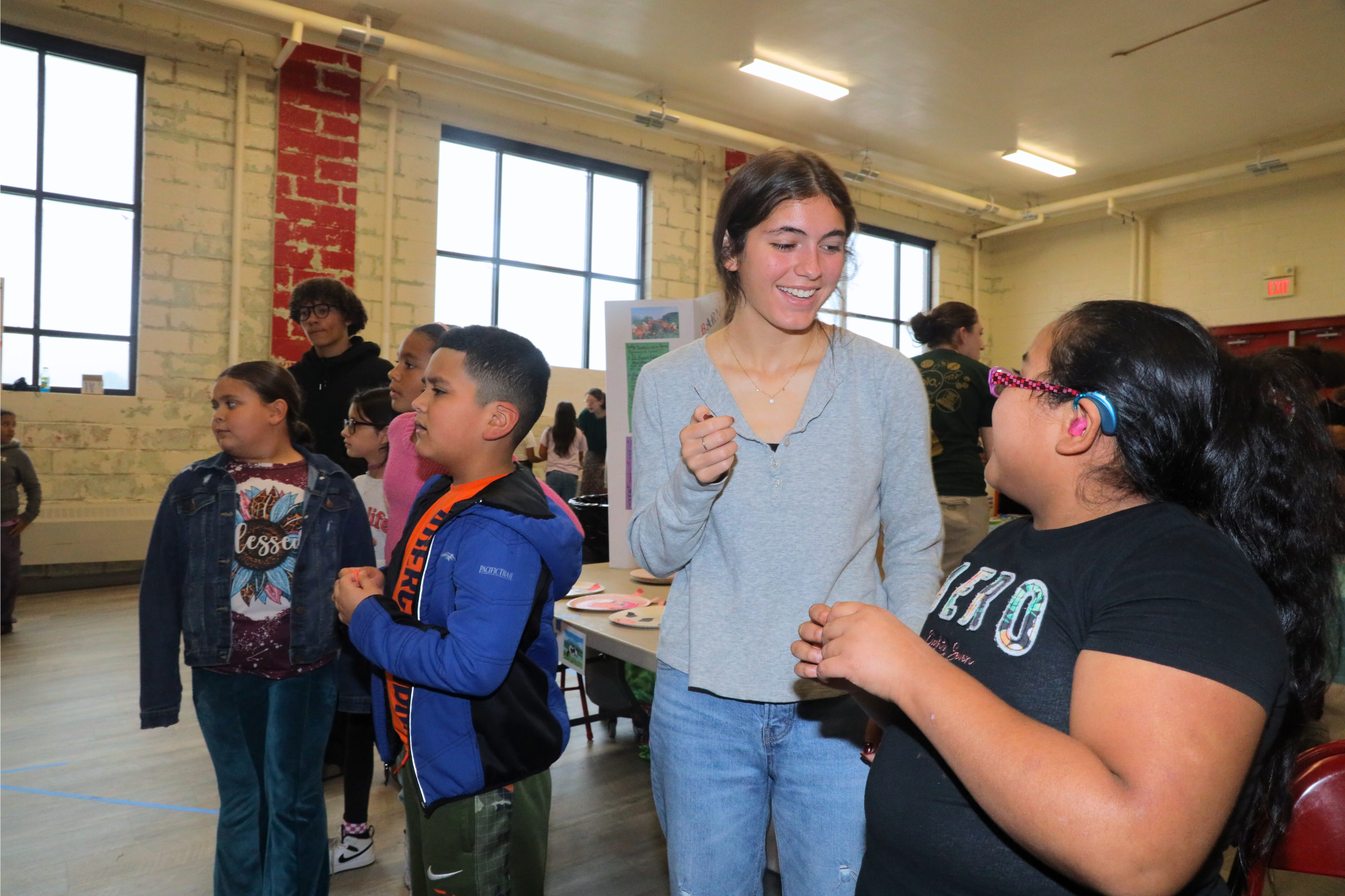 UNCP service-learning student working with a child at Deep Branch Elementary School