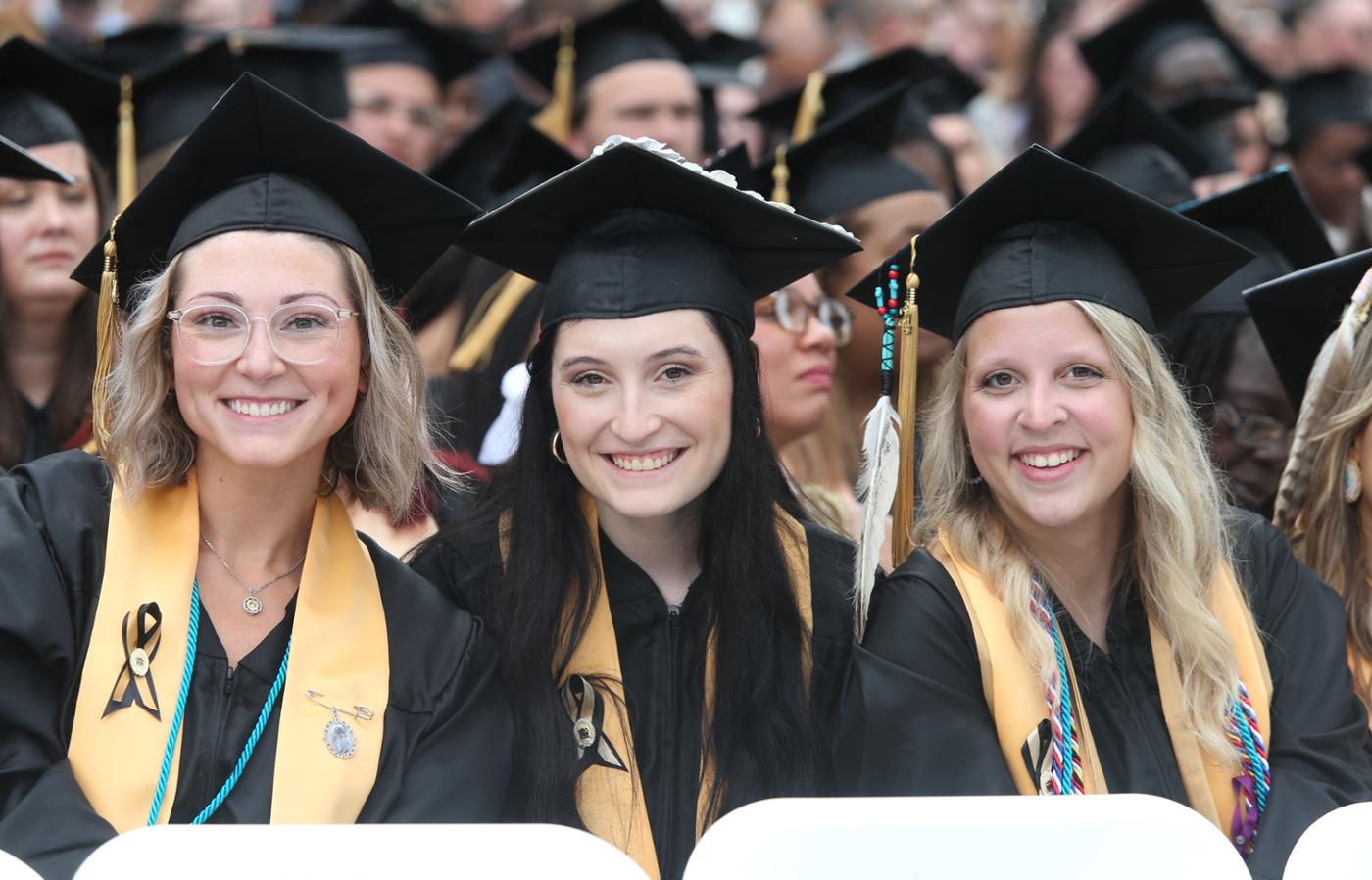 2024 UNCP Graduates wears philanthropy cords