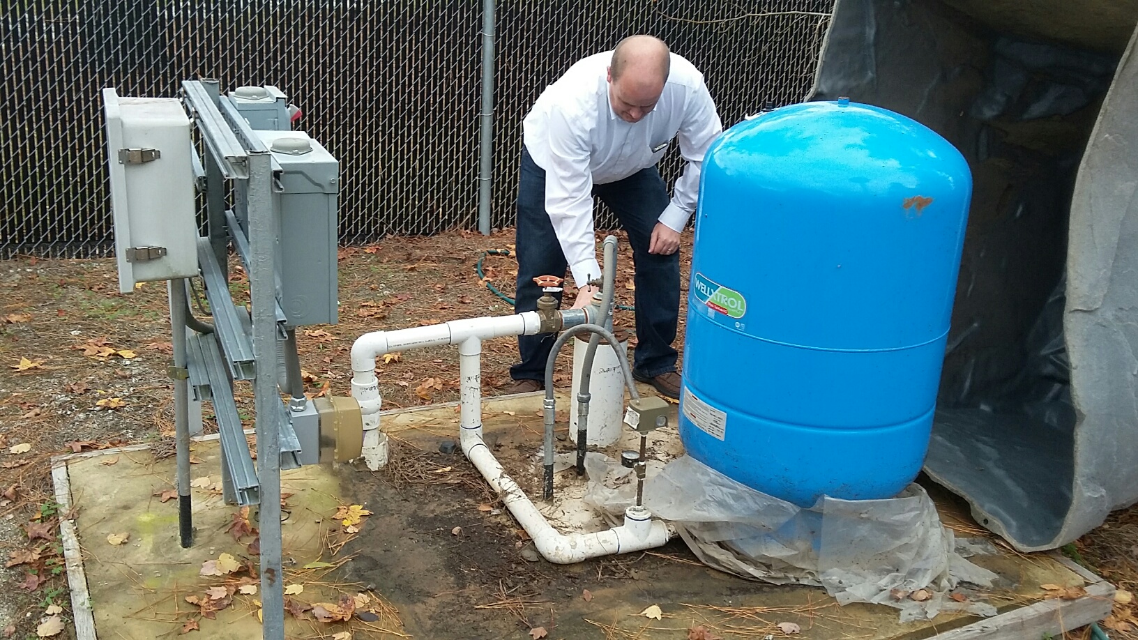 Dr. Nelson at a well