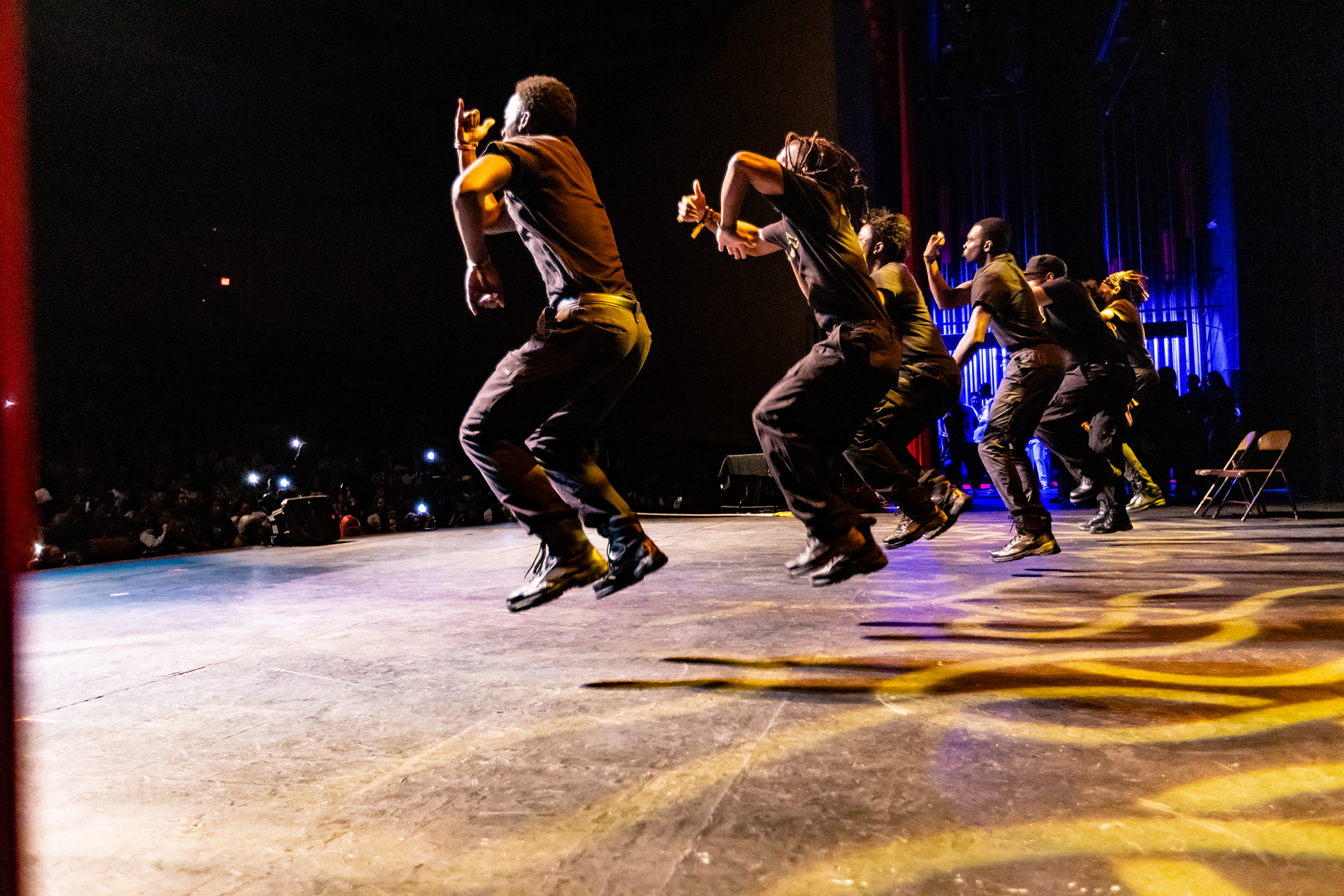 UNC Pemboke students compete in a step show on stage at Givens Performing Arts Center