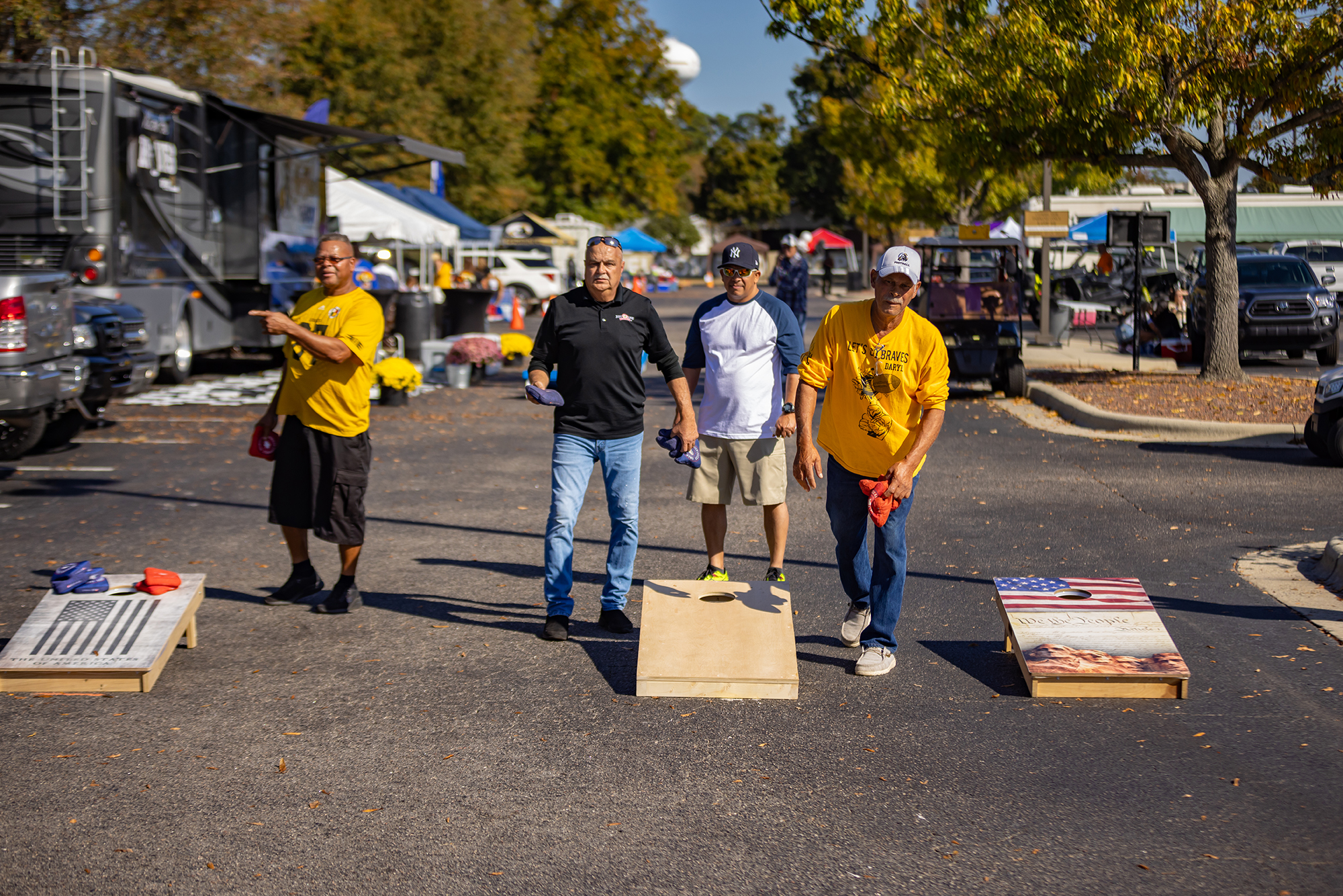 UNC Pembroke alumni playing cornhole at homecoming 
