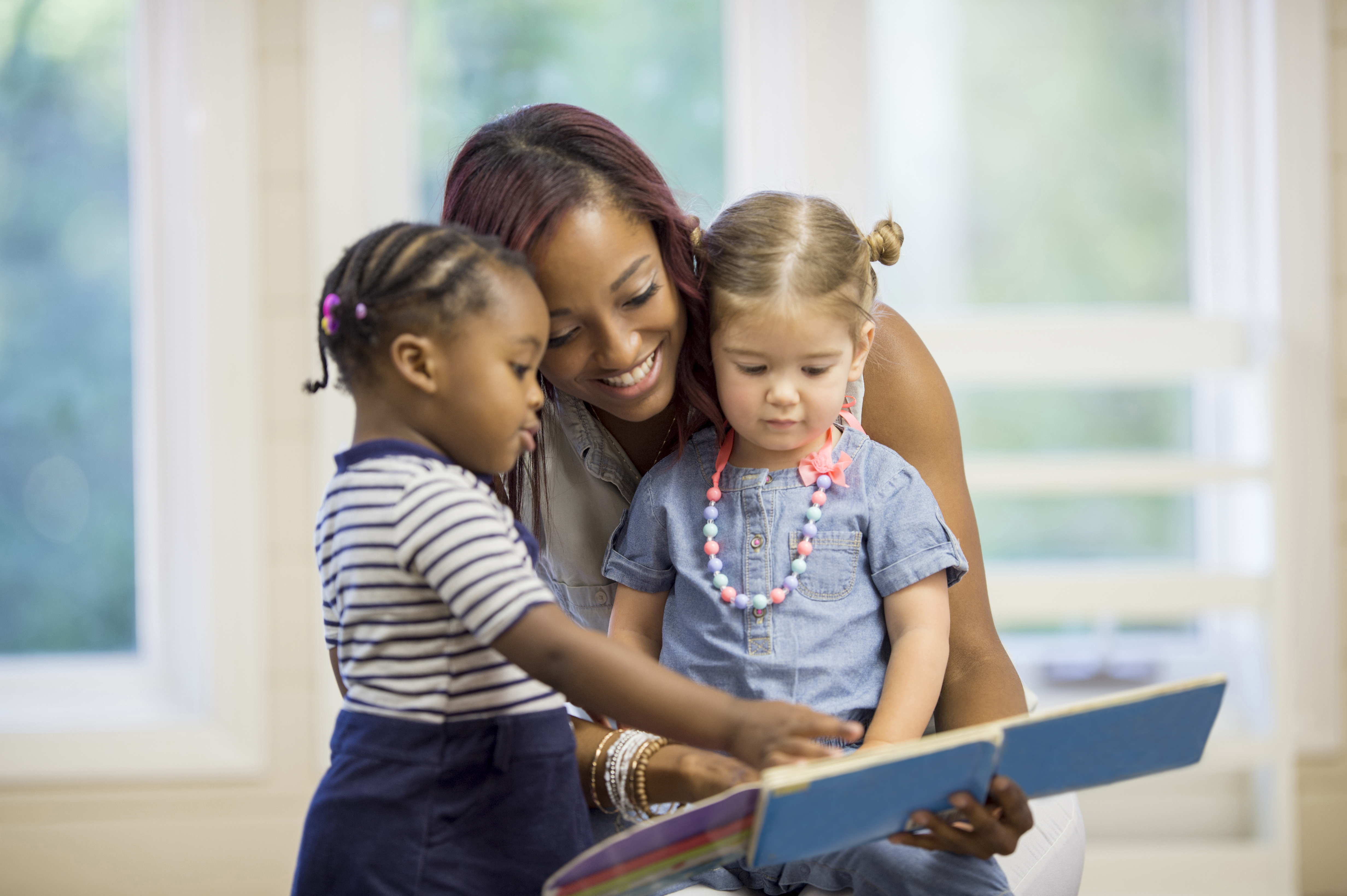 teacher with two students